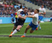 Stuart Hogg scores the Scotland's fourth try against Italy in Rome.
