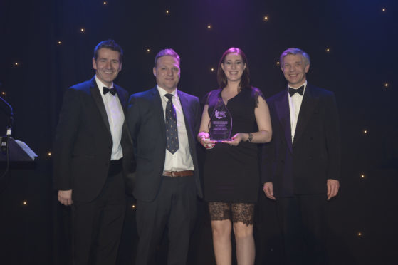 AGMG collect their award at the 2018 Scottish Rural Awards at Dynamic Earth.