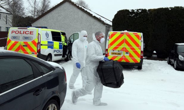 Forensic officers in Hazel Court, Alyth, the scene of the alleged murder of Dundee man John Donachy.