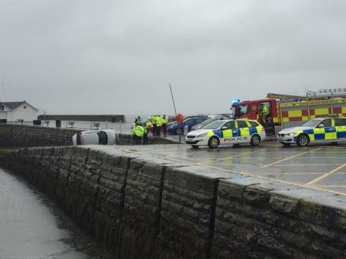 Emergency workers at the scene on Saturday (Picture by Paul McGillvery)