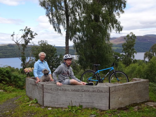 Harry on a trip to Kinloch Rannoch with his bike and family.