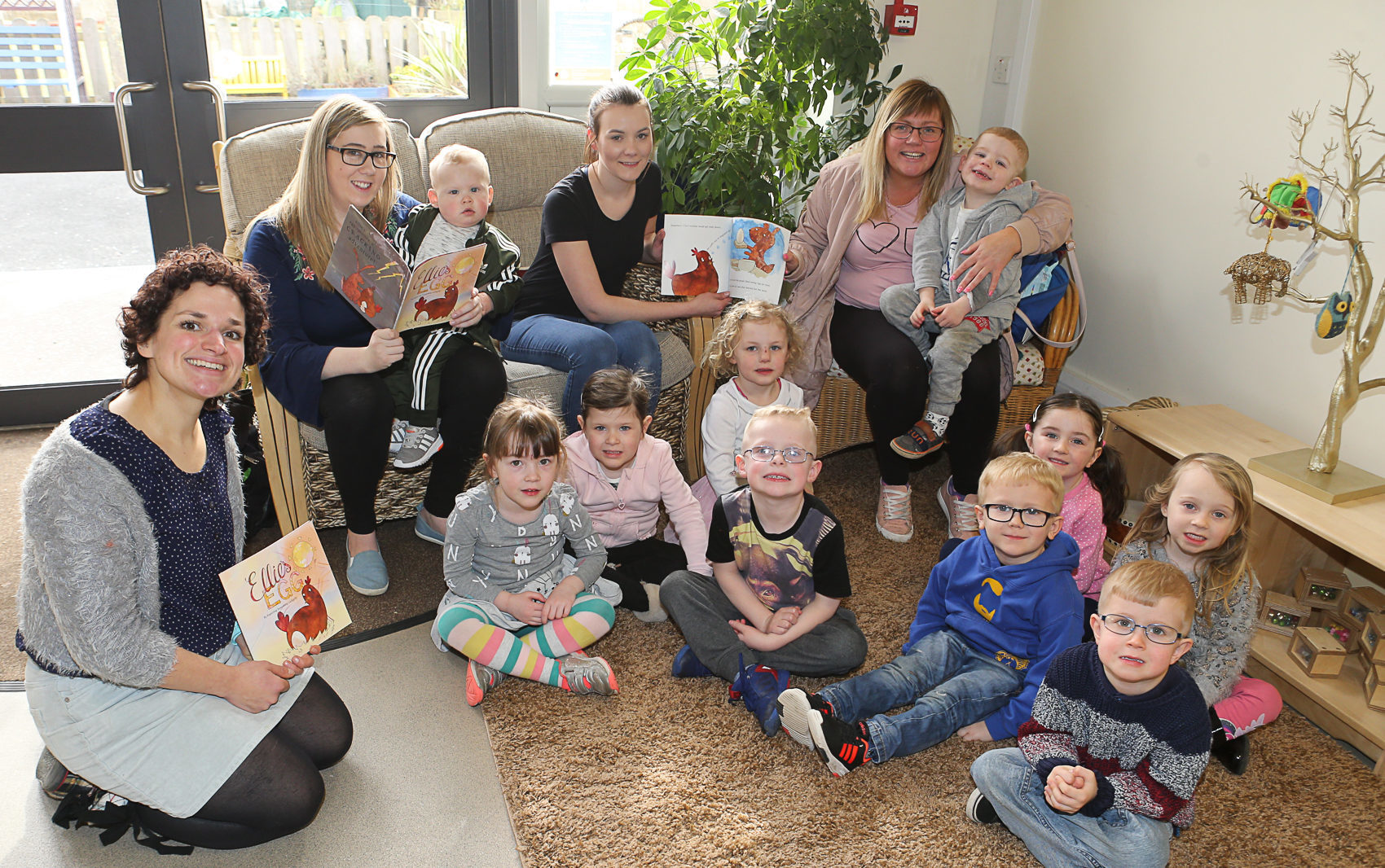 Suzanne Murray, Kayleigh Campbell and Chelsea Wright with young book worms