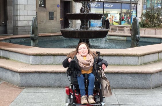 Clair D'All, Dundee ambassador for Euan's Guide, out and about in Dundee city centre.