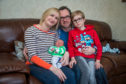 Alison Mooney with husband Frank, son Zak and baby Gabriel.