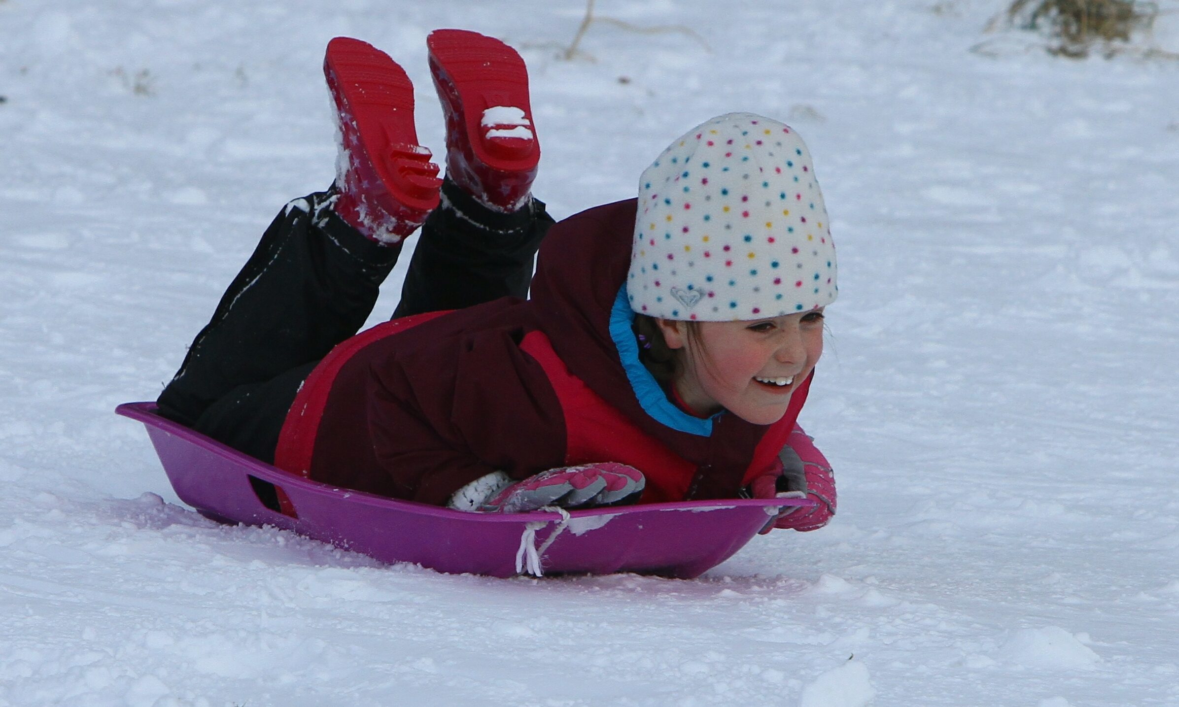 Molly Muirhead having fun in Lochee Park today. Pupils in Tayside and Fife are off until Monday at the earliest.