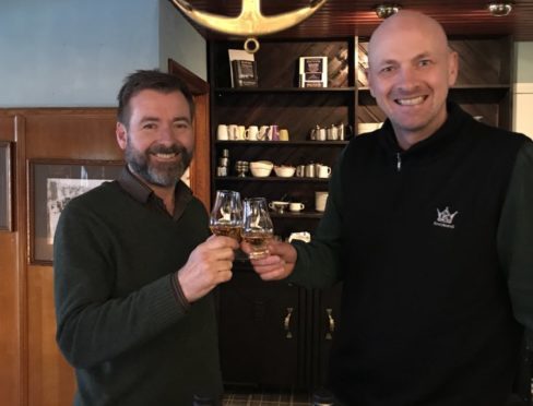 Trevor Gow the owner of The Haven Bar & Restaurant and Douglas Clement waiting for customers with a warming complimentary Wemyss Malts dram