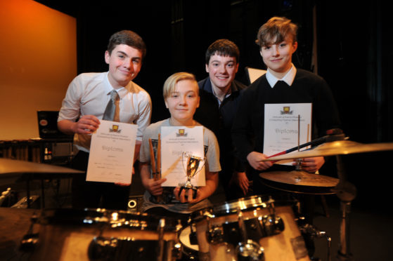 Ewan Noble, Kinga Wysocka, adjudicator Glynn Forrest and Rachel Johnston following the drum kit class at the 2018 event.