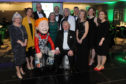 Gillian Bayford, wearing white, is pictured with the ARCHIE committee and Wullie at Friday night's bash.