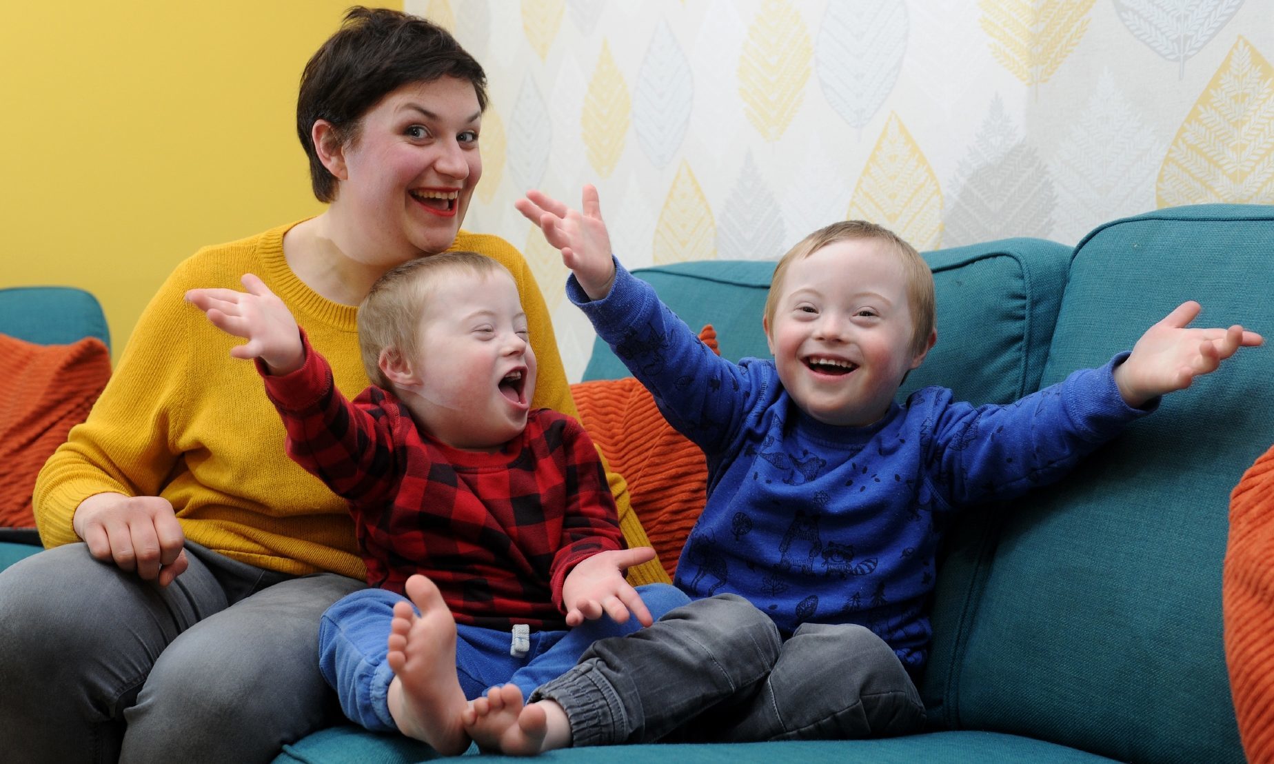 Elaine, Cameron and Ollie at home in Dundee.
