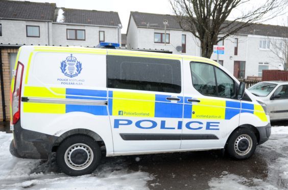 Police outside the property in Alyth in March.
