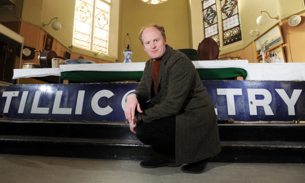 Massive railway sign from Tillicoultry railway station discovered under shed