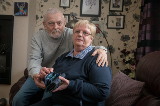 John and Muriel Ettle at their home. Muriel was targeted by a distraction thief.