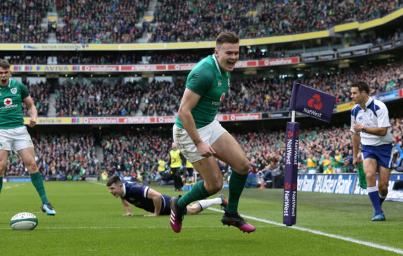 Ireland's Jacob Stockdale celebrates scoring his second try against Scotland in Dublin.