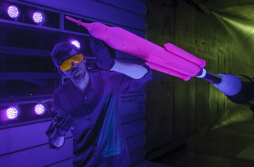 A model of the Orion spacecraft is tested in a wind tunnel