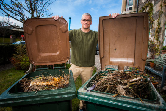 Alan Donaldson with his two full bins.