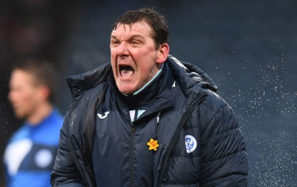 Tommy Wright celebrates at Dens Park.