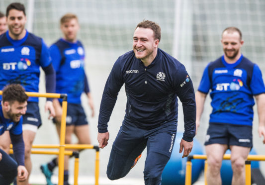Stuart Hogg enjoys Scotland's penultimate training run at Oriam ahead of the final 6 N Nations game in Rome.