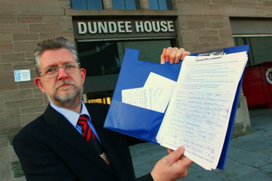 Stephen Cragg with a  petition to stop houses being built on the land of the former Kingspark school.