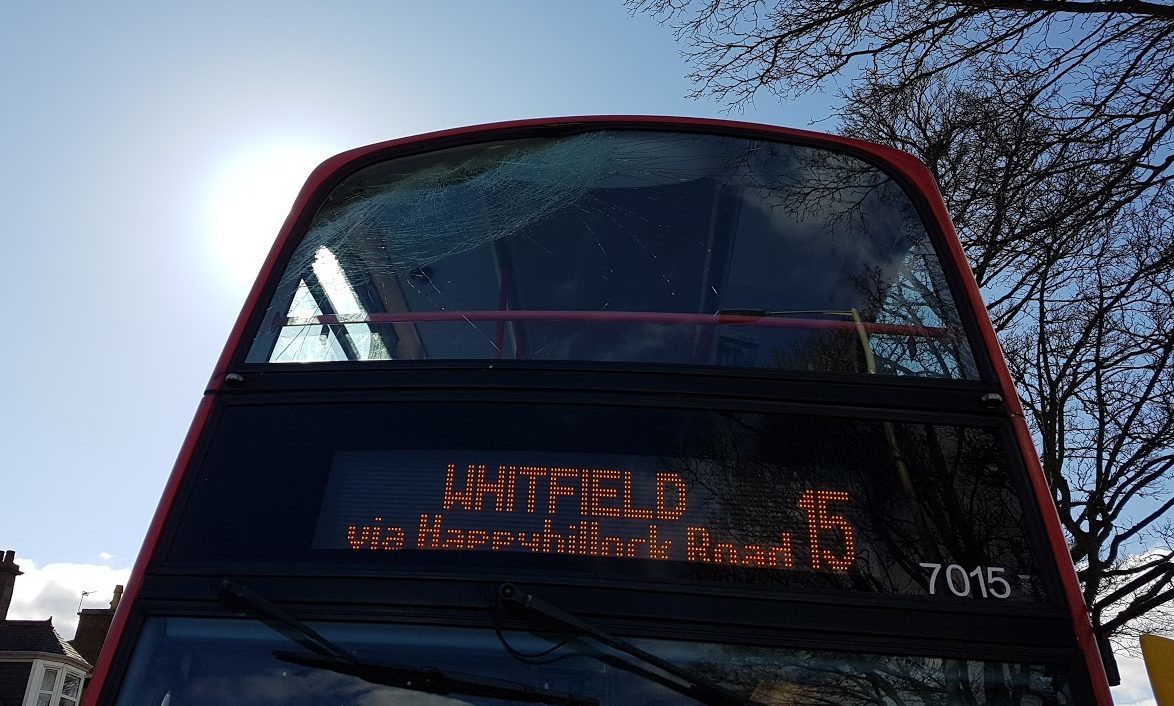 The bus was left with a smashed window