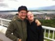Timmy and his late brother Martin pictured on Dundee Law against the backdrop of the River Tay.