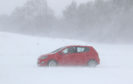 A car in snowy conditions in Larbert, near Falkirk