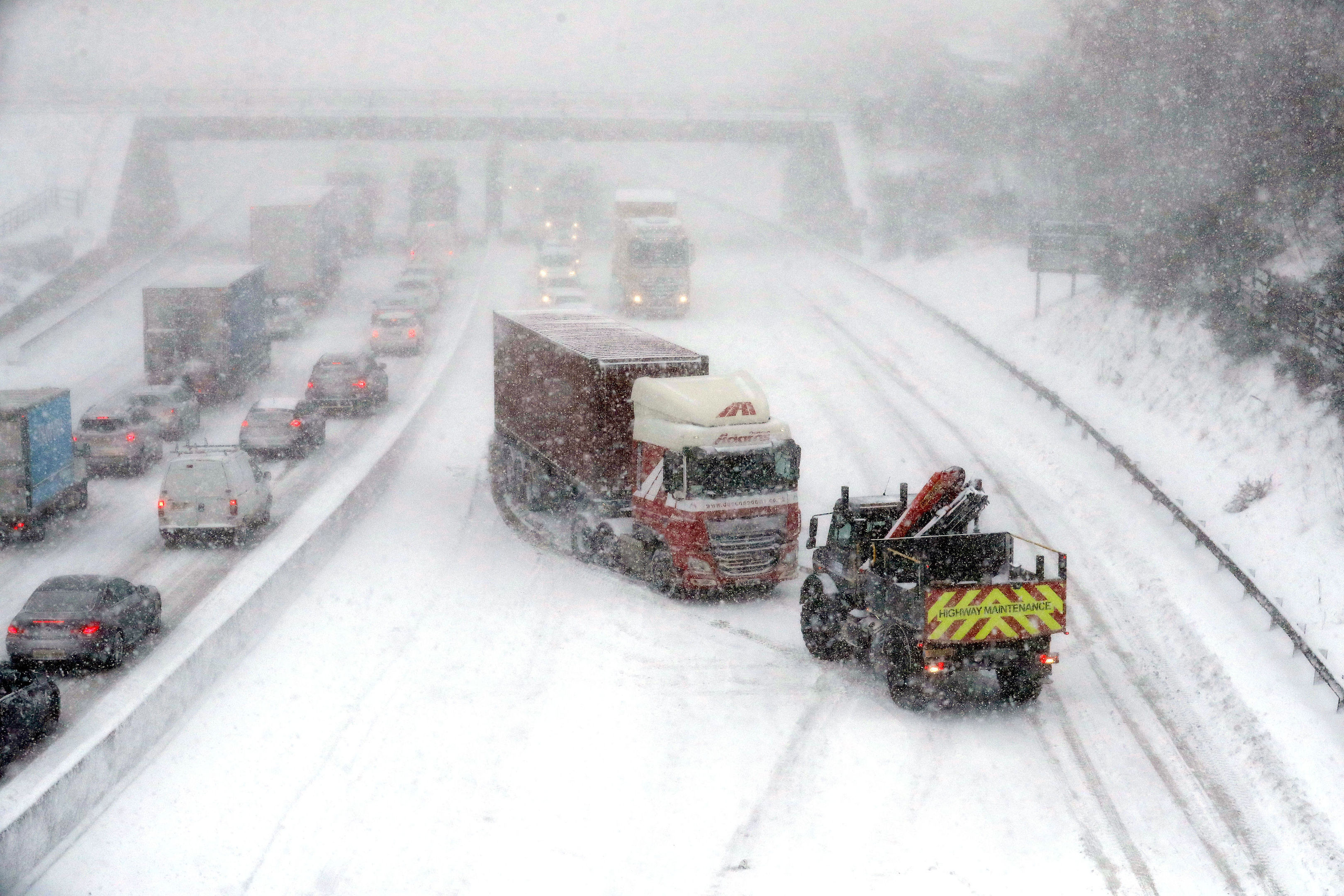 A lorry is pulled off to the side of the road on the M80 Haggs in Glasgow after getting stuck on Wednesday.