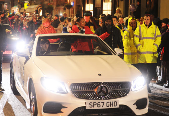 Alesha  Dixon waving to crowds at the Christmas Lights parade,