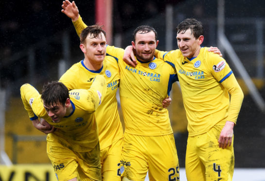 Saints celebrate a Chris Kane goal.