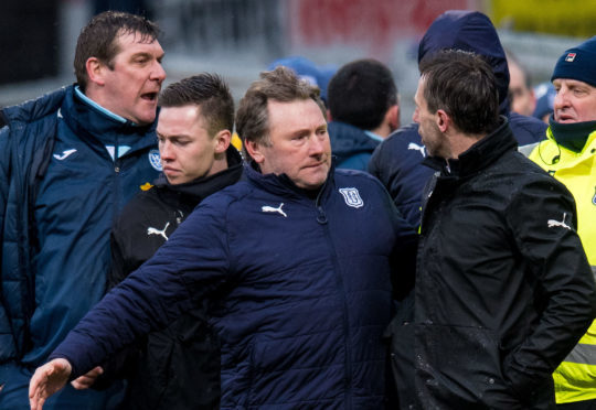 Tommy Wright and Neil McCann are kept apart.
