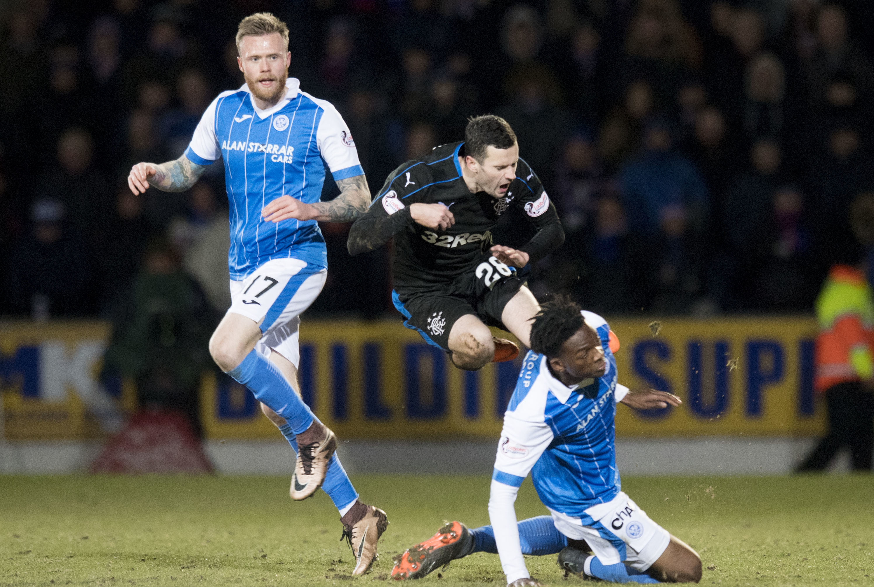 Jamie Murphy is tackled by Matty Willock.