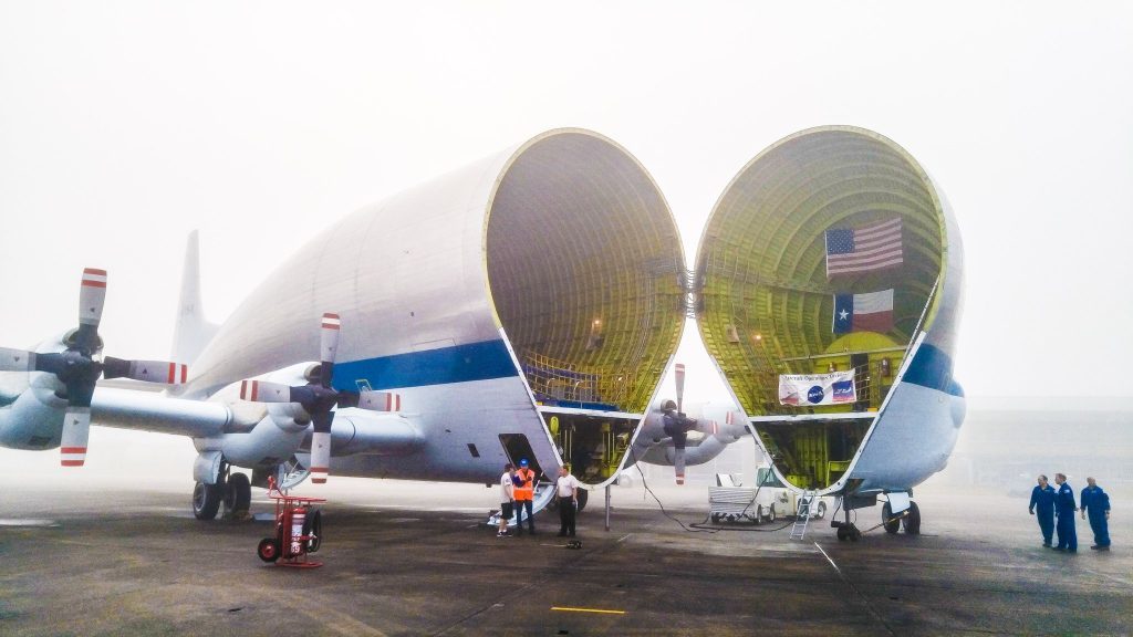 The Orion capsule is placed aboard a transporter aircraft as it undergoes further tests