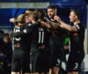 The United players celebrate Matty Smiths first goal.