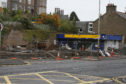 Demolition of the old Loftus petrol station in 2006.