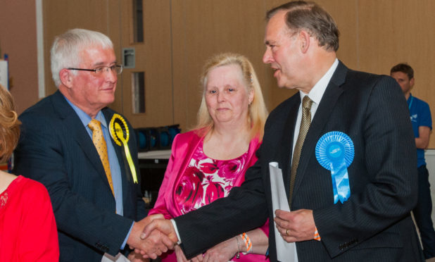 Perthshire Highland ward by-election; John Duff (conservative) wins count at Breadalbane Academy. Picture shows, left to right, John Kellas, Avril Taylor and John Duff.