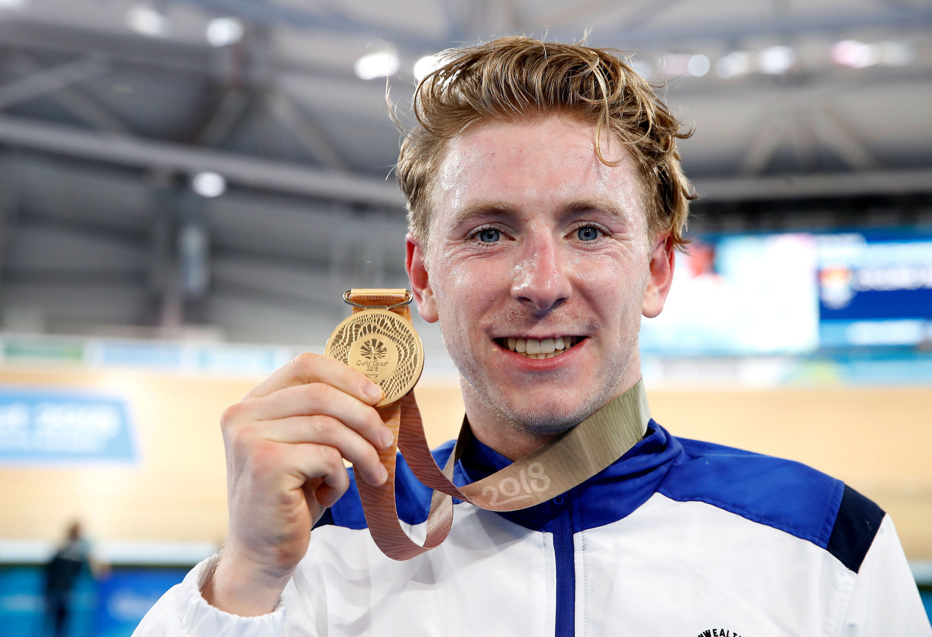 Dundee's Mark Stewart celebrates with the gold medal after winning the Men's 40km Points Race Final