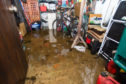 A resident's flooded shed in Seton Terrace.