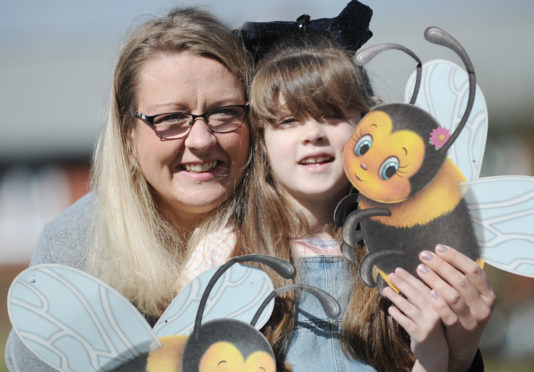 April McIntosh and daughter Peyton, 6.