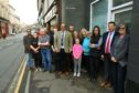 Courier News - Jim Millar story - Parking Concerns.
CR0000628
Picture shows; Cllr Gavin Nicol, centre of group, with representatives from local businesses in St. David Street, in Brechin today. Monday 16th April 2018.