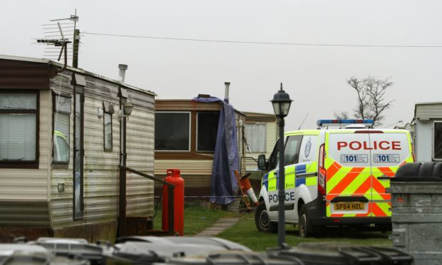 The scene of the fatal fire at Woodley Caravan Park