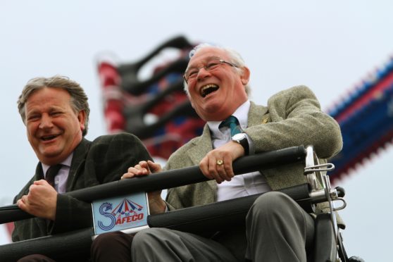 Provost of Fife Jim Leishman and Dave Torrance MSP on the Mexican Wave at the Links Market.