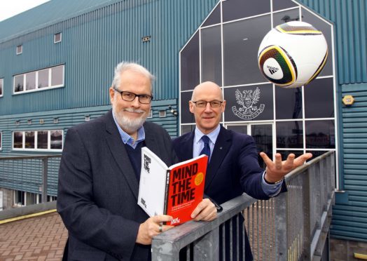 John Swinney met St Johnstone's poet in resident Jim MacIntosh with his book Mind the Time to promote their forthcoming poetry evening in support of Football Memories Scotland.