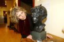 Maria MacDonell with the bust of Helen B Cruikshank from 1969, DC Thomson