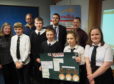 Back row from left,  GrowBiz CEO Jackie Brierton, Glen Lyon Coffee’s Jamie Grant, Breadalbane Academy teacher Tim Woodcock, Paul Newman from the Thyme at Errichel Restaurant and (front) the Spice team, Dougall Gray, Oliver Kennedy, Craig Campbell, Sarah Milne and Eilidh Hinch.