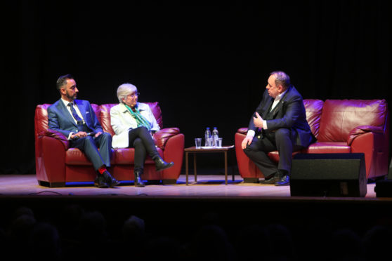 Alex Salmond on stage with Prof Clara Ponsati (Catelonia politician and St Andrews Uni lecturer) and her legal representative Aamar Anwar at Caird Hall, Dundee.