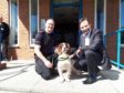 Police dog Buddy with his handler PC Ryan Galloway and Liam Kerr MSP