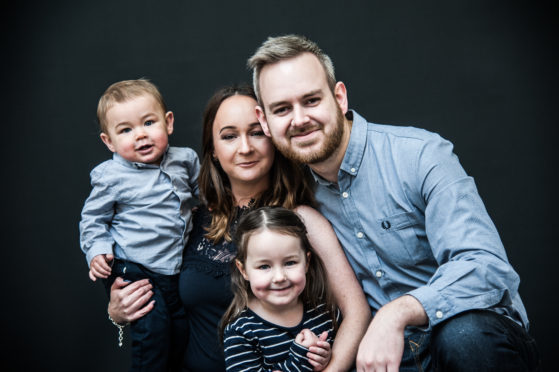 Linzi pictured with her family.