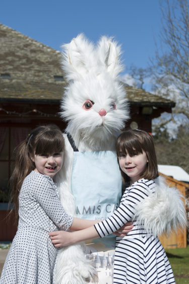 Holly McIntyre, the Easter Bunny and Beth McIntyre.