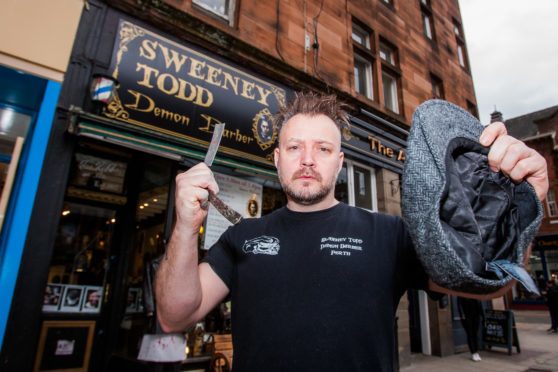 Will Robertson outside his Sweeney Todd Barbers.