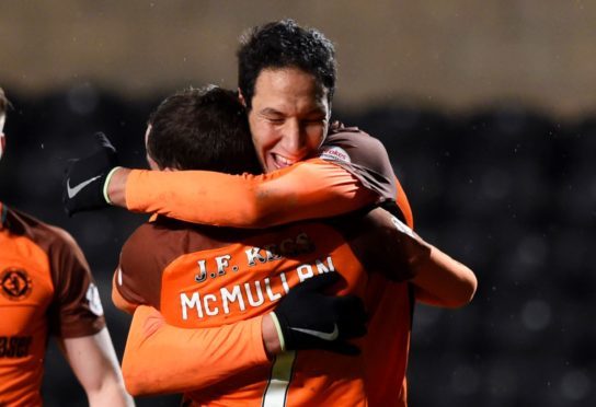 Bilel Mohsni is congratulated by fellow goalscorer Paul McMullan.