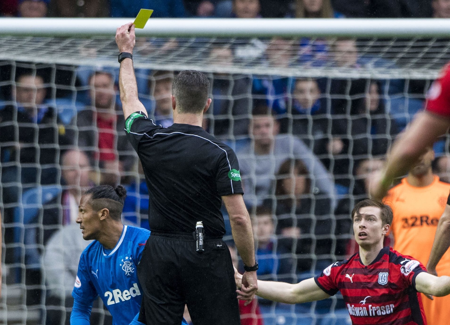 Bruno Alves is booked for his terrible challenge on Craig Wighton.